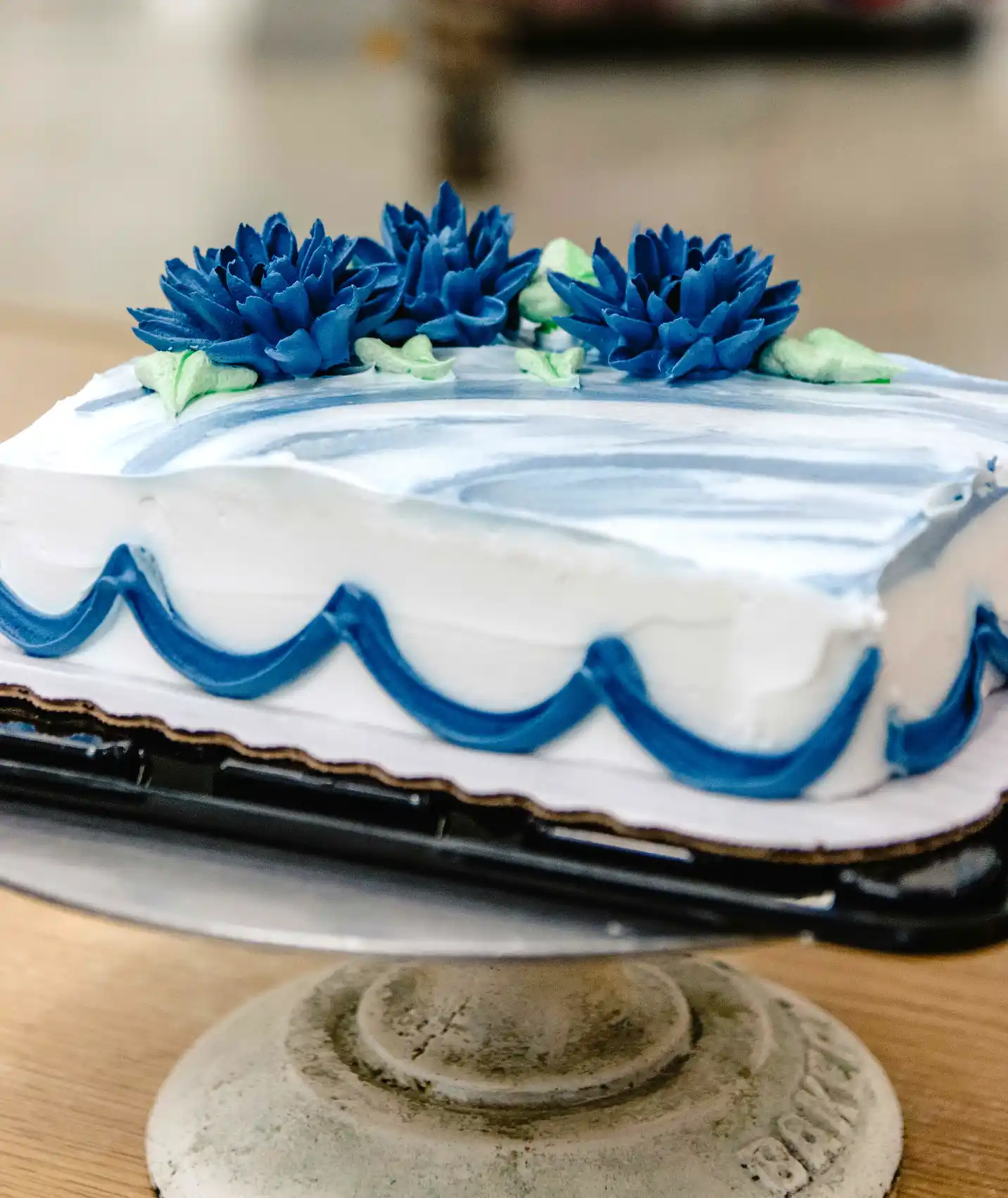 a beautiful white and blue icing, chocolate sheet cake